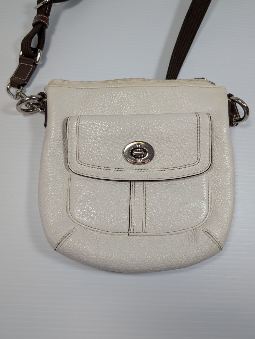 Coach Off White Pebbled Leather Chelsea Crossbody Turnlock Purse Brown Strap
